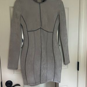 Sold.  Light grey with dark grey piping fitting dress